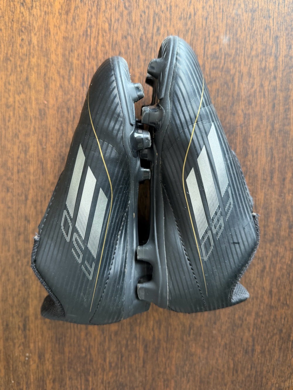 adidas Kids’ F50 Club FxG Velcro Soccer Cleats
